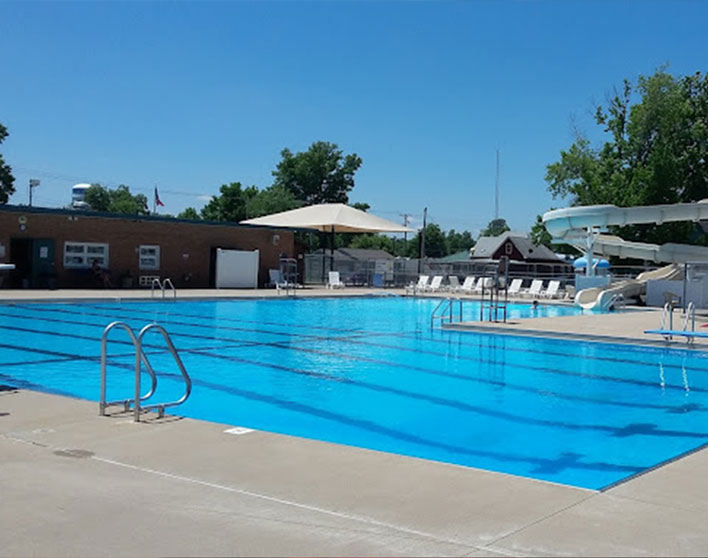 Aquatic Center pool with a slide and diving board