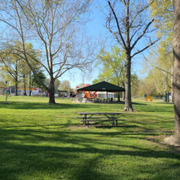 Ray Fosse Park field with trees and picnic table